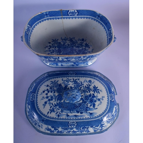 8 - A LARGE EARLY 19TH CENTURY ENGLISH BLUE AND WHITE TUREEN AND COVER decorated with bold foliage. 30 c... 