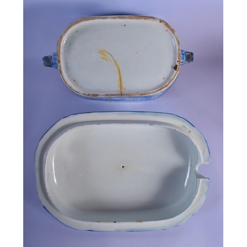 8 - A LARGE EARLY 19TH CENTURY ENGLISH BLUE AND WHITE TUREEN AND COVER decorated with bold foliage. 30 c... 