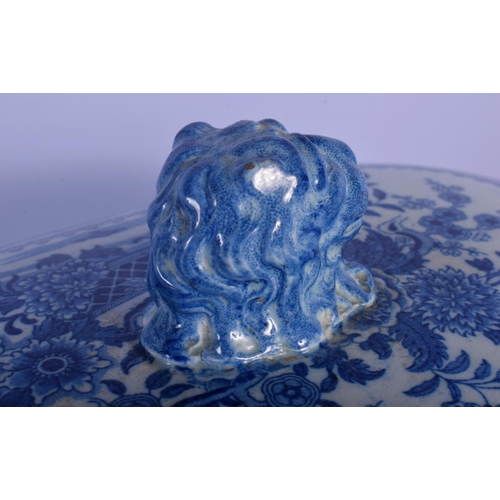 8 - A LARGE EARLY 19TH CENTURY ENGLISH BLUE AND WHITE TUREEN AND COVER decorated with bold foliage. 30 c... 