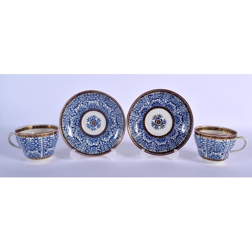 82 - 18TH C. WORCESTER PAIR OF COFFEE CUPS WITH ENTWINED HANDLES AND SAUCERs PAINTED WITH ROYAL LILY, CRE... 