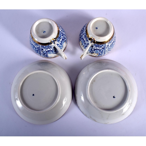 82 - 18TH C. WORCESTER PAIR OF COFFEE CUPS WITH ENTWINED HANDLES AND SAUCERs PAINTED WITH ROYAL LILY, CRE... 