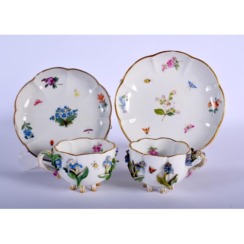 97 - LATE 19TH C. MEISSEN TWO CUP AND A SAUCER PAINTED AND ENCRUASTED WITH FLOWERS ON STANDING ON FEET AN... 
