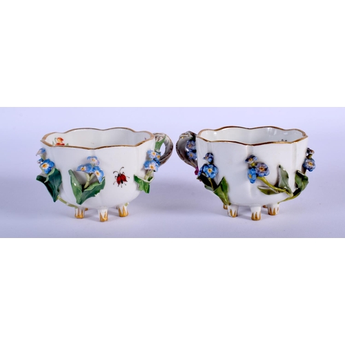 97 - LATE 19TH C. MEISSEN TWO CUP AND A SAUCER PAINTED AND ENCRUASTED WITH FLOWERS ON STANDING ON FEET AN... 