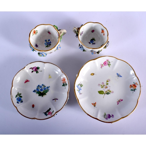 97 - LATE 19TH C. MEISSEN TWO CUP AND A SAUCER PAINTED AND ENCRUASTED WITH FLOWERS ON STANDING ON FEET AN... 