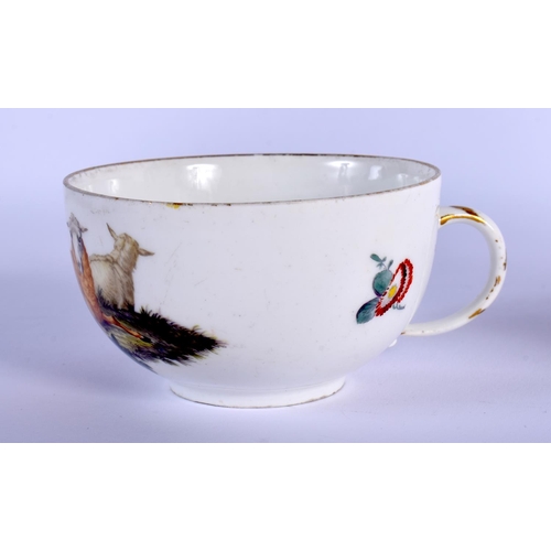 98 - MEISSEN TEACUP AND SAUCER PAINTED WITH A LANDSCAPE VIGNETTE DEPICTING CHILDREN IN CLASSICAL ROBES WI... 