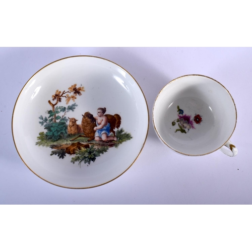 98 - MEISSEN TEACUP AND SAUCER PAINTED WITH A LANDSCAPE VIGNETTE DEPICTING CHILDREN IN CLASSICAL ROBES WI... 