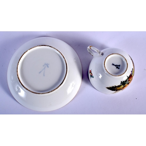 98 - MEISSEN TEACUP AND SAUCER PAINTED WITH A LANDSCAPE VIGNETTE DEPICTING CHILDREN IN CLASSICAL ROBES WI... 