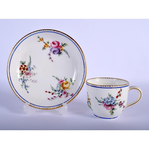 99 - 18TH C. SEVRES GOOD COFFEEE CUP AND SAUCER BOLDLLEY PAINTED WITH FLOWERS UNDER A BLUE LINE DENTIL GI... 