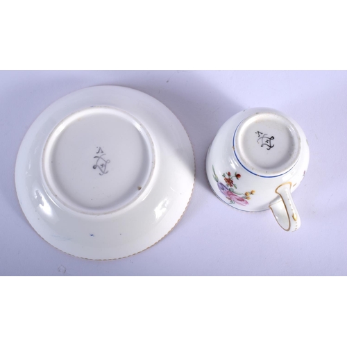 99 - 18TH C. SEVRES GOOD COFFEEE CUP AND SAUCER BOLDLLEY PAINTED WITH FLOWERS UNDER A BLUE LINE DENTIL GI... 