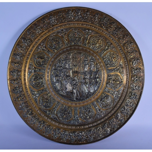 317 - A VERY LARGE 19TH CENTURY INDIAN MIDDLE EASTERN SILVER OVERLAID CHARGER of massive proportions, deco... 