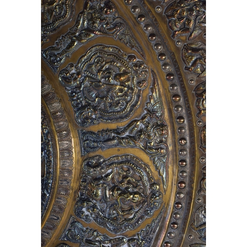 317 - A VERY LARGE 19TH CENTURY INDIAN MIDDLE EASTERN SILVER OVERLAID CHARGER of massive proportions, deco... 