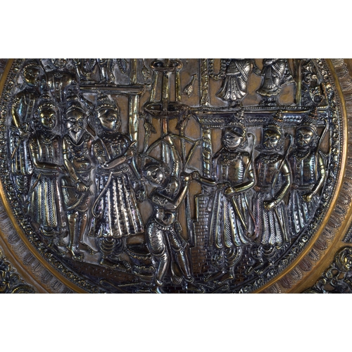 317 - A VERY LARGE 19TH CENTURY INDIAN MIDDLE EASTERN SILVER OVERLAID CHARGER of massive proportions, deco... 