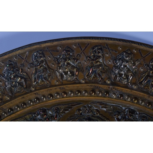 317 - A VERY LARGE 19TH CENTURY INDIAN MIDDLE EASTERN SILVER OVERLAID CHARGER of massive proportions, deco... 