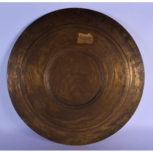 317 - A VERY LARGE 19TH CENTURY INDIAN MIDDLE EASTERN SILVER OVERLAID CHARGER of massive proportions, deco... 