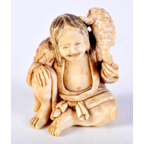 10 - A FINE 19TH CENTURY JAPANESE MEIJI PERIOD CARVED IVORY NETSUKE modelled as a boy holding a toad. 5 c... 