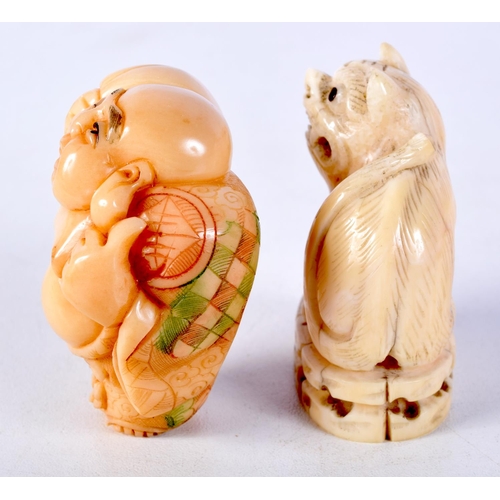 12 - A 19TH CENTURY CHINESE CARVED IVORY FIGURE OF A BEAST together with a carved tag nut netsuke. Larges... 
