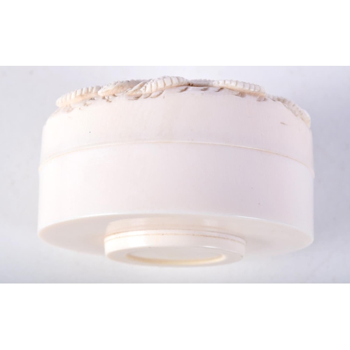 16 - A 19TH CENTURY JAPANESE MEIJI PERIOD CARVED IVORY BOX AND COVER decorated with dragons. 7 cm diamete... 