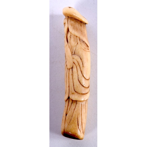 17 - AN 18TH CENTURY JAPANESE EDO PERIOD CARVED STAG ANTLER NETSUKE modelled as a Dutchman. 10 cm high.