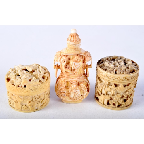 20 - A PAIR OF 19TH CENTURY CHINESE CANTON IVORY BOXES together with a similar snuff bottle. Largest 7 cm... 