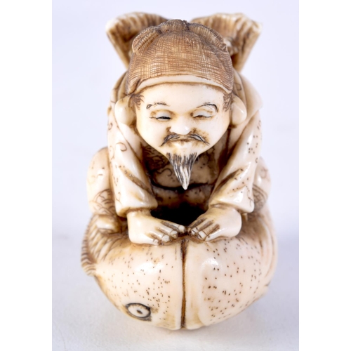 23 - A FINE 19TH CENTURY JAPANESE MEIJI PERIOD CARVED IVORY NETSUKE modelled as a male riding a fish. 5 c... 