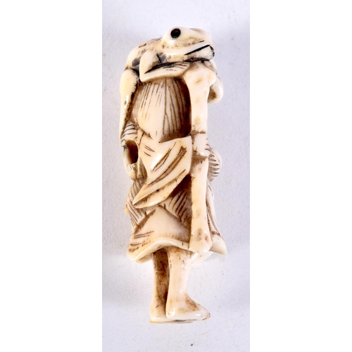 25 - A 19TH CENTURY JAPANESE MEIJI PERIOD CARVED IVORY NETSUKE modelled as a male holding a toad. 6 cm hi... 