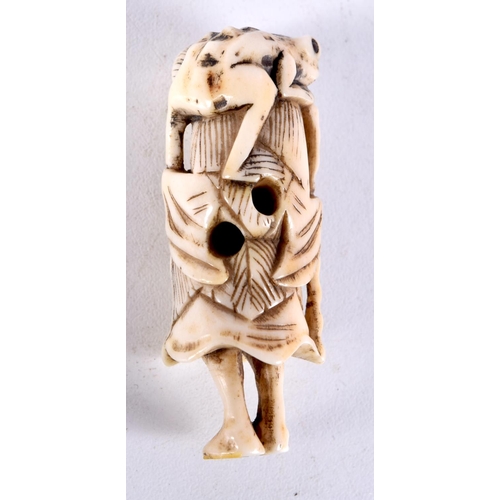 25 - A 19TH CENTURY JAPANESE MEIJI PERIOD CARVED IVORY NETSUKE modelled as a male holding a toad. 6 cm hi... 