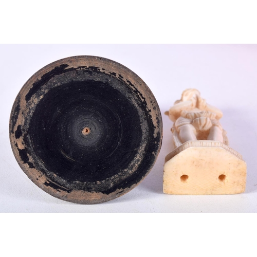 34 - TWO 19TH CENTURY ANGLO INDIAN CARVED IVORY FIGURES each modelled in a buddhistic stance. Largest 11 ... 