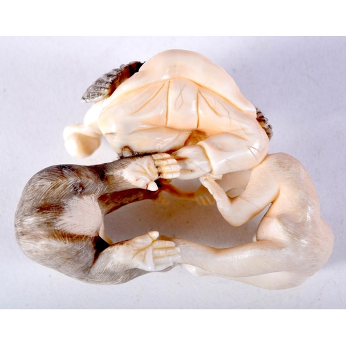 44 - A 19TH CENTURY JAPANESE MEIJI PERIOD CARVED IVORY OKIMONO modelled as monkeys and birds. 6.5 cm x 4 ... 