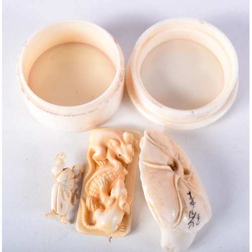 48 - A 19TH CENTURY JAPANESE MEIJI PERIOD CARVED IVORY BOX AND COVER together with two netsukes and anoth... 