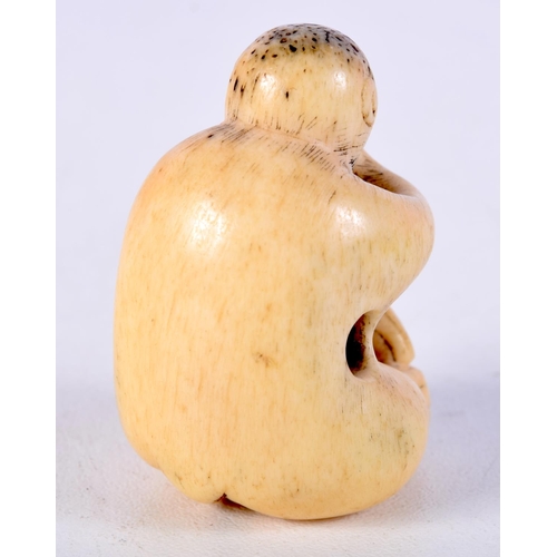 5 - A 19TH CENTURY JAPANESE MEIJI PERIOD CARVED STAG ANTLER NETSUKE formed as a seated monkey. 4 cm x 2 ... 