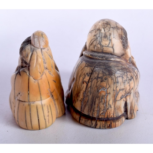 51 - TWO 19TH CENTURY CHINESE CARVED MAMMOTH IVORY FIGURES OF SCHOLARS. Largest 5.5 cm x 5.5 cm. (2)
