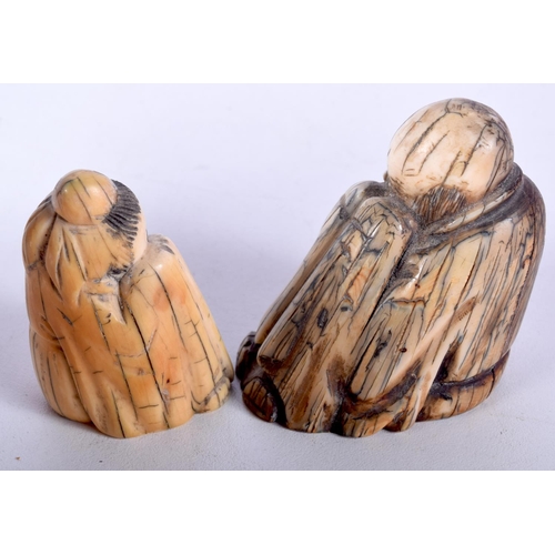 51 - TWO 19TH CENTURY CHINESE CARVED MAMMOTH IVORY FIGURES OF SCHOLARS. Largest 5.5 cm x 5.5 cm. (2)