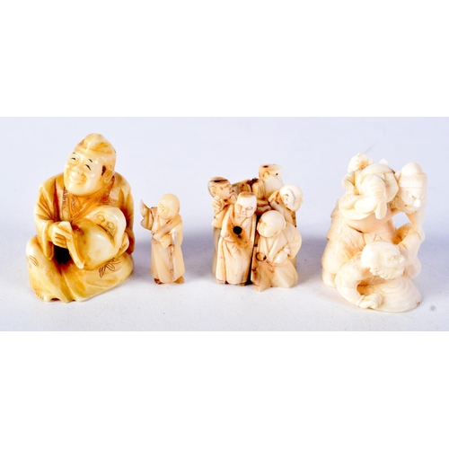 58 - A 19TH CENTURY JAPANESE MEIJI PERIOD CARVED IVORY NETSUKE together with two similar okimono. Largest... 