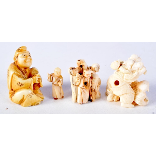 58 - A 19TH CENTURY JAPANESE MEIJI PERIOD CARVED IVORY NETSUKE together with two similar okimono. Largest... 
