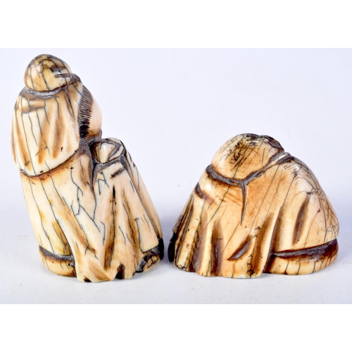 59 - TWO 19TH CENTURY CHINESE CARVED MAMMOTH IVORY FIGURES OF SCHOLARS. Largest 5.5 cm x 5.5 cm. (2)