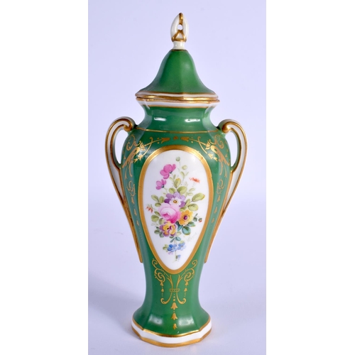 135 - ROYAL WORCESTER VASE AND COVER PAINTED WITH FLOWERS ON AN AVACADO GREEN GROUND SIGNED W. POWELL, PRO... 