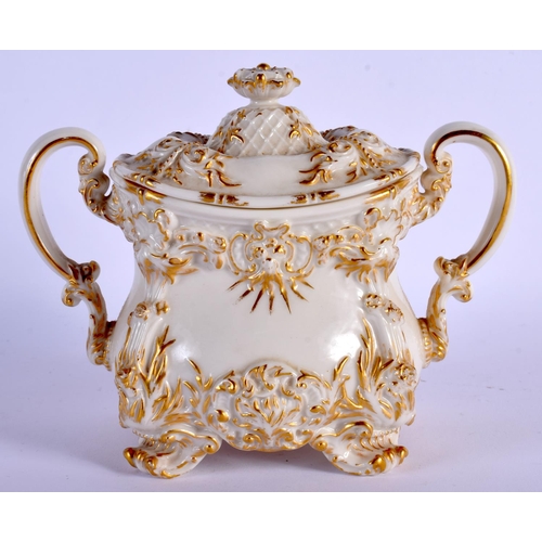 139 - ROYAL WORCESTER ROCOCO MOULDED  SUCRIER AND COVER OF RARE SHAPE HIGHLIGHTED WITH GILDING ON A IVORY ... 