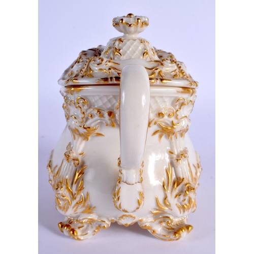 139 - ROYAL WORCESTER ROCOCO MOULDED  SUCRIER AND COVER OF RARE SHAPE HIGHLIGHTED WITH GILDING ON A IVORY ... 
