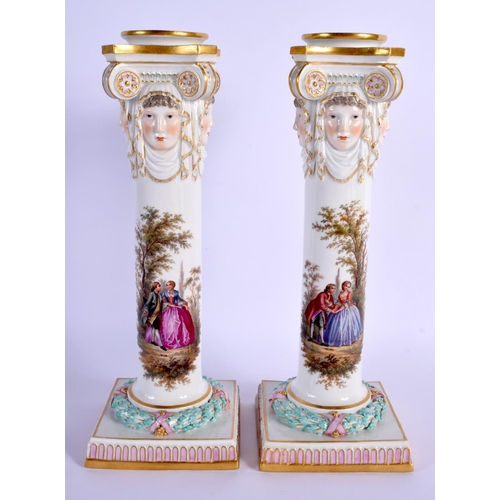 14 - A RARE PAIR OF 19TH CENTURY MEISSEN PORCELAIN CANDLESTICKS painted with figures. 24 cm high.