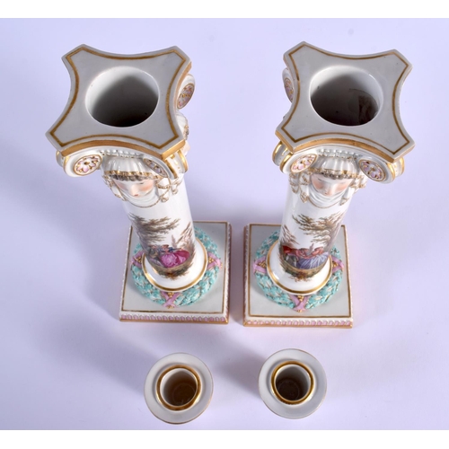 14 - A RARE PAIR OF 19TH CENTURY MEISSEN PORCELAIN CANDLESTICKS painted with figures. 24 cm high.