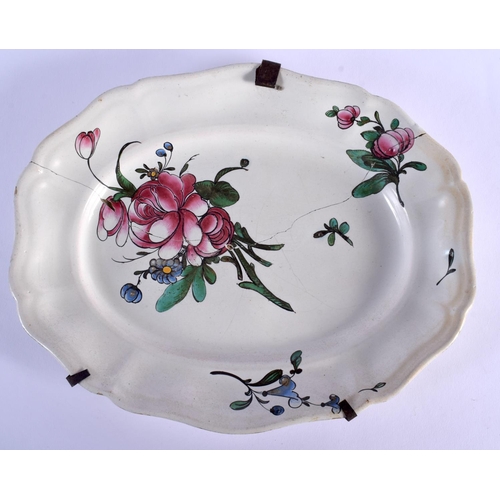 19 - AN 18TH CENTURY FRANCE STRASBOURG FAIENCE TIN GLAZED DISH painted with flowers. 24 cm x 20 cm.