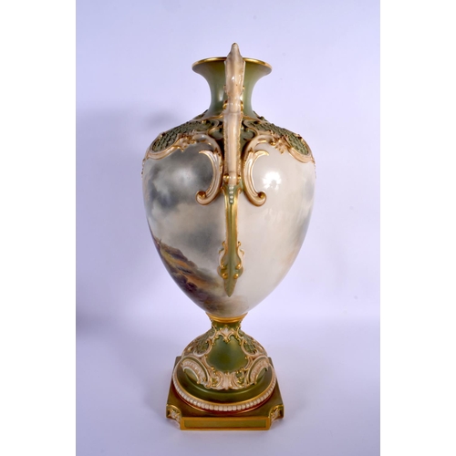 217 - A LARGE ROYAL WORCESTER TWIN HANDLED PORCELAIN VASE by John Stinton, painted with highland cattle wi... 