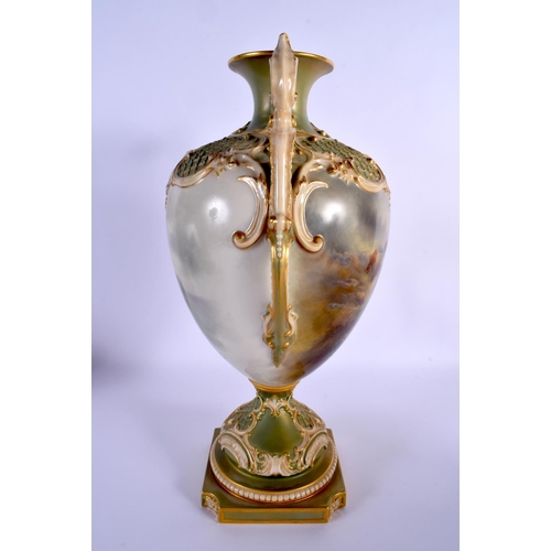217 - A LARGE ROYAL WORCESTER TWIN HANDLED PORCELAIN VASE by John Stinton, painted with highland cattle wi... 