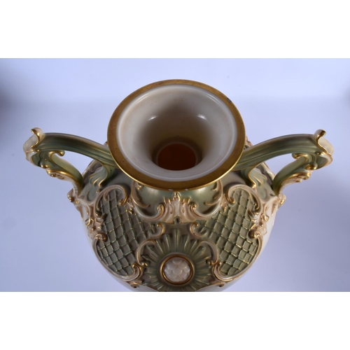 217 - A LARGE ROYAL WORCESTER TWIN HANDLED PORCELAIN VASE by John Stinton, painted with highland cattle wi... 