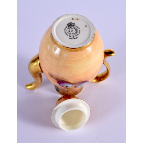 221 - A SMALL ROYAL WORCESTER FRUIT PAINTED COFFEE POT AND COVER with scrolling handle. 137 cm x 7 cm.