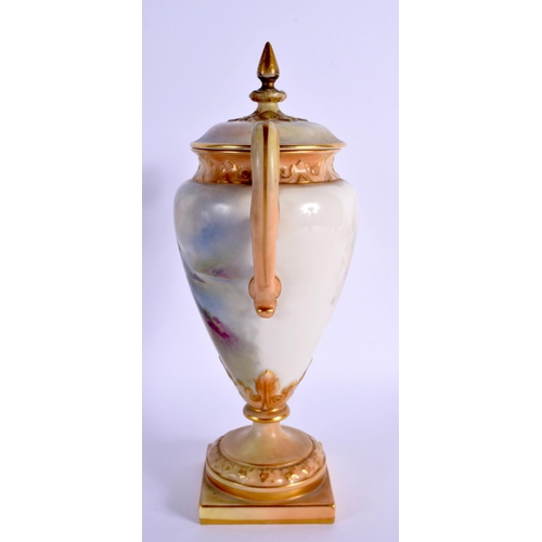 223 - A ROYAL WORCESTER TWIN HANDLED PORCELAIN VASE AND COVER by Harry Davis, painted with two sheep withi... 