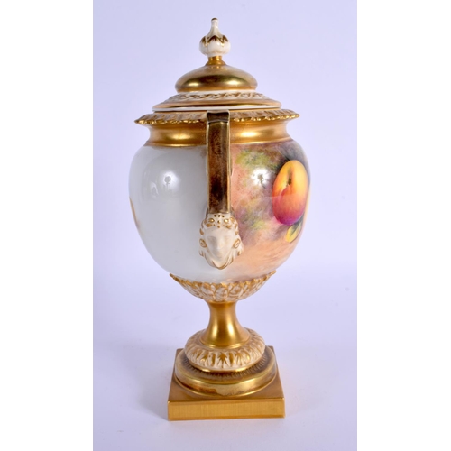 225 - A ROYAL WORCESTER FRUIT PAINTED TWIN HANDLED VASE AND COVER by Telford. 21 cm x 8 cm.