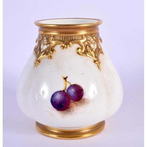 238 - A ROYAL WORCESTER FRUIT PAINTED BULBOUS VASE by Freeman. 9.5 cm x 7.5 cm.