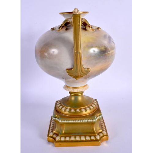 241 - AN UNUSUAL ROYAL WORCESTER TWIN HANDLED PORCELAIN VASE by Harry Stinton, painted with highland cattl... 