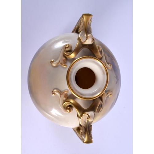 241 - AN UNUSUAL ROYAL WORCESTER TWIN HANDLED PORCELAIN VASE by Harry Stinton, painted with highland cattl... 